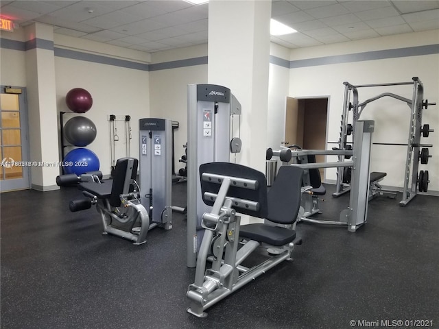5825 Collins Ave Unit 2D, Miami Beach, FL 33140 - workout area with a paneled ceiling