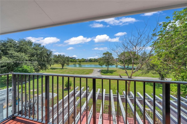717 NW 105th Pl Unit C2, Miami, FL 33172 - balcony with a water view and view of scattered trees