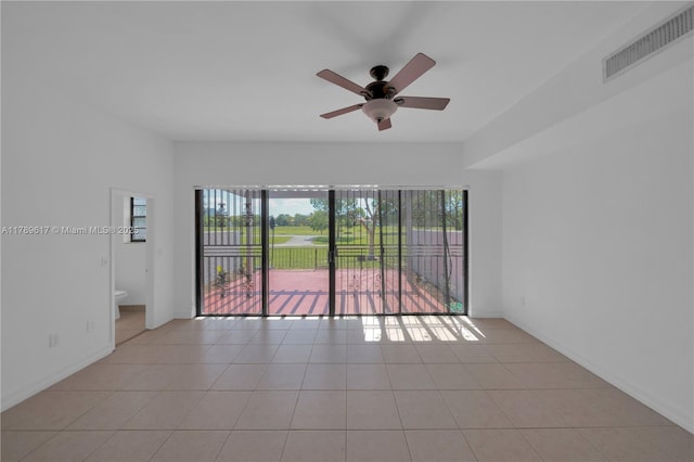 717 NW 105th Pl Unit C2, Miami, FL 33172 - unfurnished room with healthy amount of natural light, ceiling fan, and light tile patterned flooring