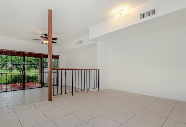 717 NW 105th Pl Unit C2, Miami, FL 33172 - empty room featuring ceiling fan, tile patterned flooring, and baseboards