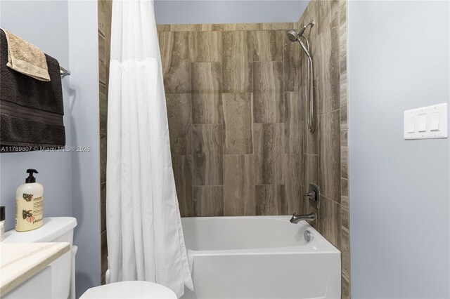 full bathroom featuring shower / tub combo and toilet