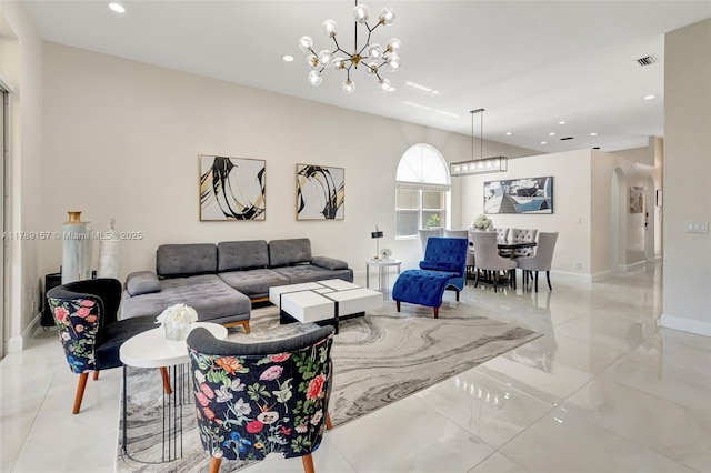 living room featuring baseboards, visible vents, an inviting chandelier, and recessed lighting