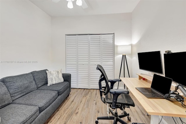 office featuring light wood-style floors and a ceiling fan