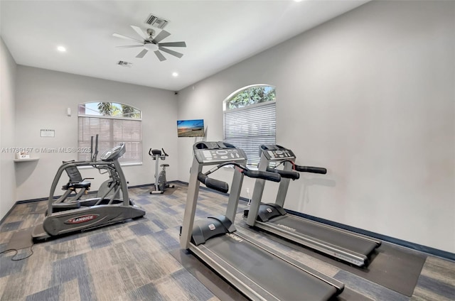 exercise area with visible vents, a ceiling fan, and recessed lighting