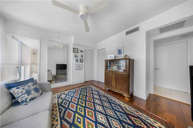 665 NE 25th St Unit 1201, Miami, FL 33137 - living room featuring wood finished floors, visible vents, baseboards, and ceiling fan