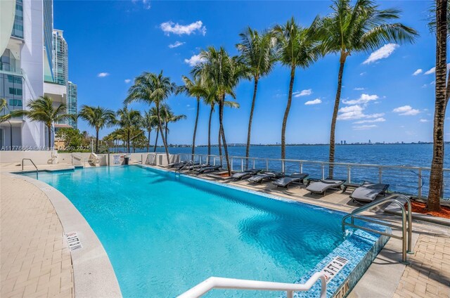 665 NE 25th St Unit 1201, Miami, FL 33137 - pool featuring a patio area and a water view