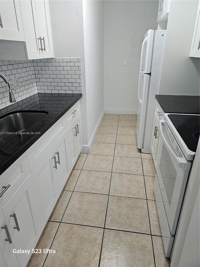 7250 SW 94th Pl Unit B8, Miami, FL 33173 - kitchen with white appliances, a sink, light tile patterned floors, and dark countertops