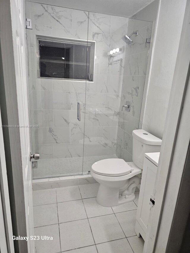 7250 SW 94th Pl Unit B8, Miami, FL 33173 - bathroom with toilet, vanity, a marble finish shower, and tile patterned flooring