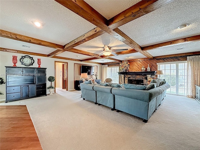 547 Deer Creek Run, Deerfield Beach, FL 33442 - living area featuring baseboards, a ceiling fan, a textured ceiling, and beamed ceiling