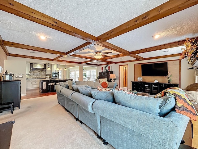547 Deer Creek Run, Deerfield Beach, FL 33442 - living area with coffered ceiling, light carpet, beamed ceiling, a textured ceiling, and ceiling fan