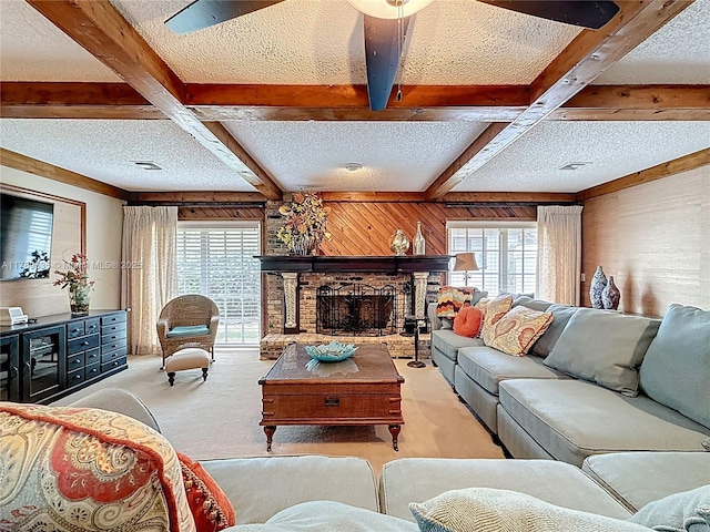 547 Deer Creek Run, Deerfield Beach, FL 33442 - carpeted living area with beamed ceiling, plenty of natural light, and a textured ceiling