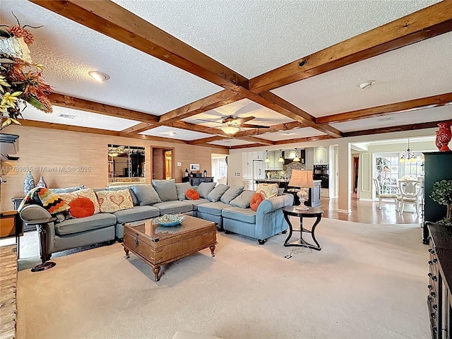 547 Deer Creek Run, Deerfield Beach, FL 33442 - carpeted living area featuring coffered ceiling, beam ceiling, and a textured ceiling