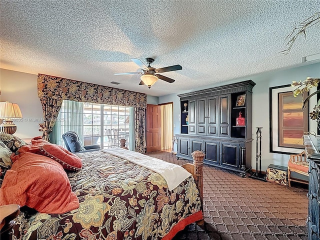 547 Deer Creek Run, Deerfield Beach, FL 33442 - bedroom with dark carpet, a textured ceiling, a ceiling fan, and visible vents