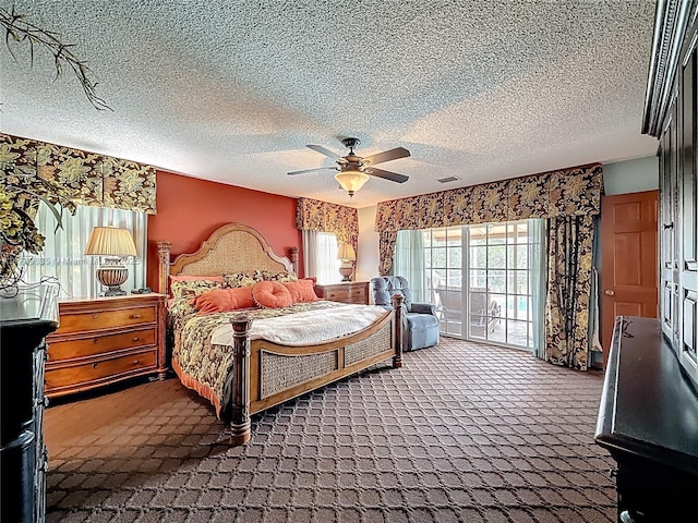 547 Deer Creek Run, Deerfield Beach, FL 33442 - carpeted bedroom featuring visible vents, a textured ceiling, and ceiling fan