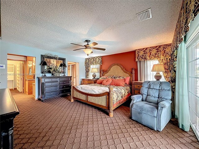 547 Deer Creek Run, Deerfield Beach, FL 33442 - carpeted bedroom featuring a ceiling fan, a textured ceiling, and visible vents