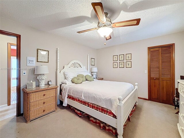 547 Deer Creek Run, Deerfield Beach, FL 33442 - bedroom with light colored carpet, a ceiling fan, and a textured ceiling