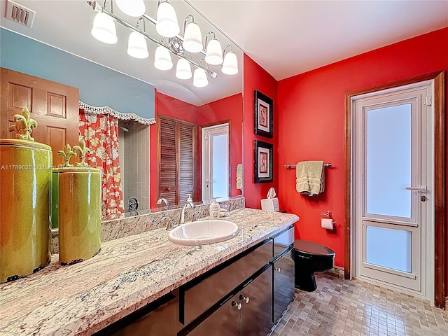 547 Deer Creek Run, Deerfield Beach, FL 33442 - full bath with baseboards, visible vents, vanity, and toilet