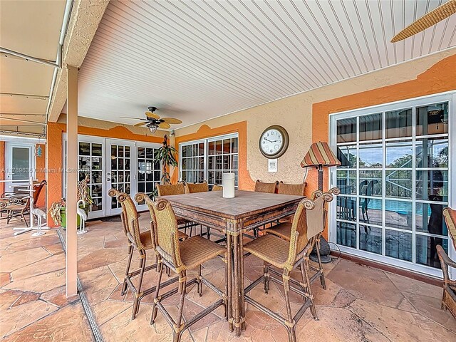 547 Deer Creek Run, Deerfield Beach, FL 33442 - view of patio with ceiling fan, french doors, and outdoor dining space