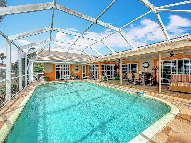 547 Deer Creek Run, Deerfield Beach, FL 33442 - pool featuring a ceiling fan, glass enclosure, and a patio