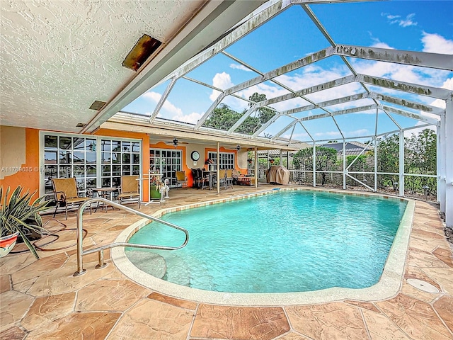 547 Deer Creek Run, Deerfield Beach, FL 33442 - outdoor pool featuring a patio area, a lanai, and ceiling fan