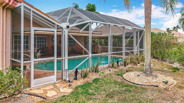 547 Deer Creek Run, Deerfield Beach, FL 33442 - outdoor pool featuring glass enclosure and a patio area