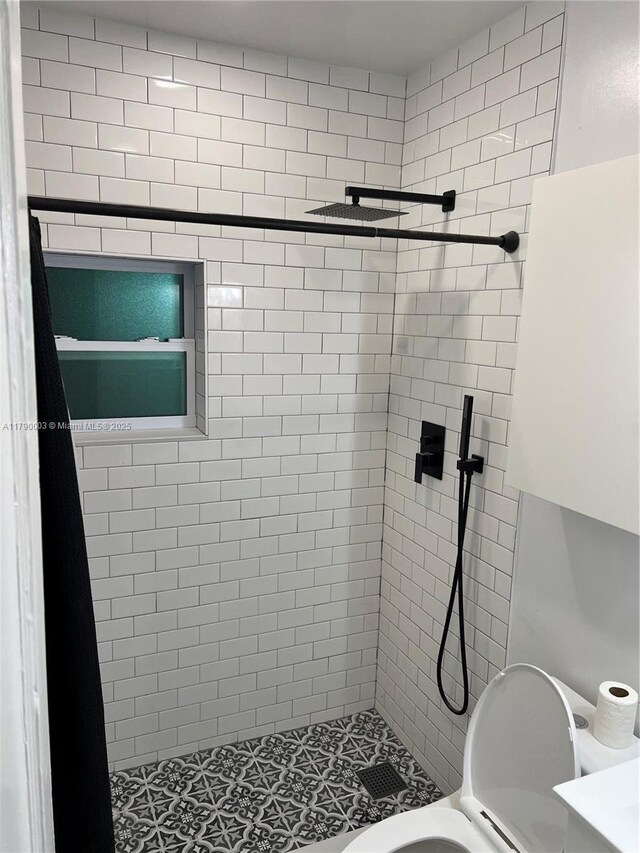 1001 NE 111th St, Biscayne Park, FL 33161 - full bathroom with a shower stall and toilet