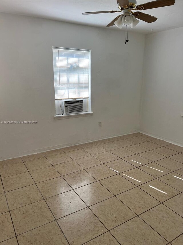 1001 NE 111th St, Biscayne Park, FL 33161 - tiled empty room featuring baseboards, a ceiling fan, and cooling unit