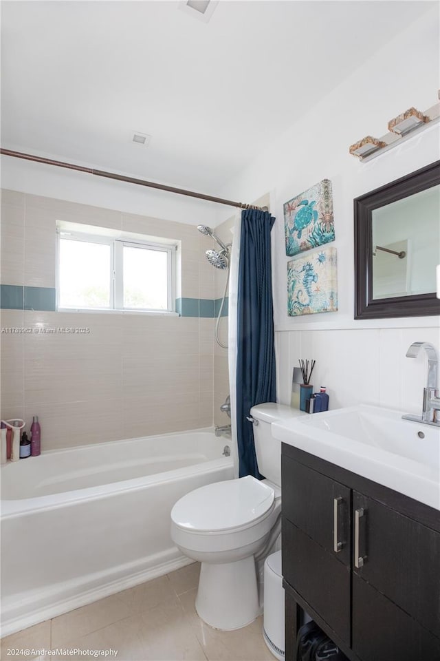 5901 NE 4th Ave, Oakland Park, FL 33334 - bathroom with shower / tub combo, toilet, vanity, and tile patterned floors