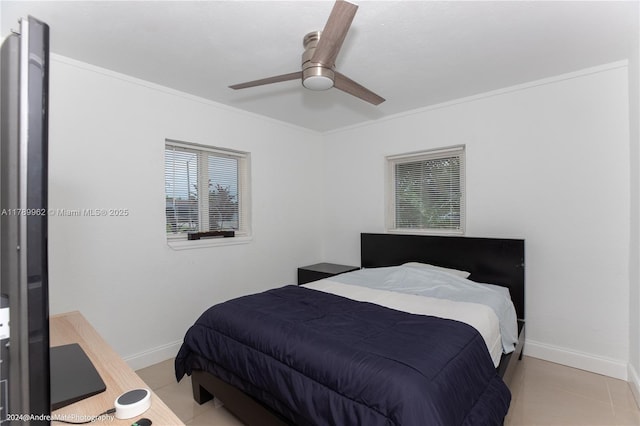 5901 NE 4th Ave, Oakland Park, FL 33334 - bedroom with a ceiling fan, baseboards, and ornamental molding