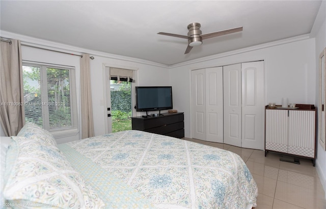 5901 NE 4th Ave, Oakland Park, FL 33334 - bedroom with tile patterned floors, a ceiling fan, access to outside, and a closet