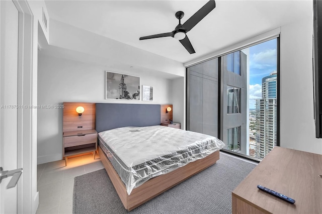 601NE 1st Ave Unit 4609, Miami, FL 33132 - bedroom with ceiling fan, multiple windows, visible vents, and floor to ceiling windows