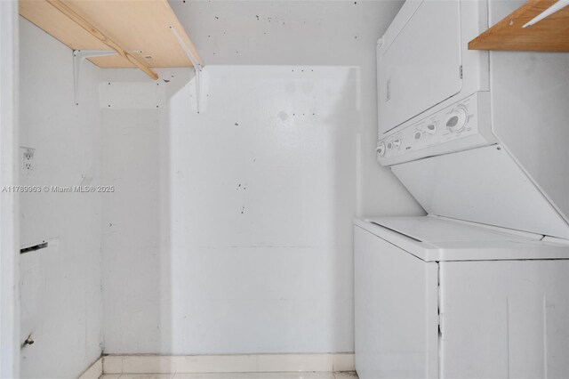 151 Crandon Blvd Unit 138, Key Biscayne, FL 33149 - laundry area featuring laundry area and stacked washing maching and dryer
