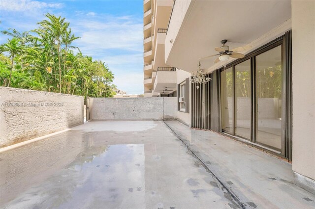 151 Crandon Blvd Unit 138, Key Biscayne, FL 33149 - view of patio with ceiling fan and fence