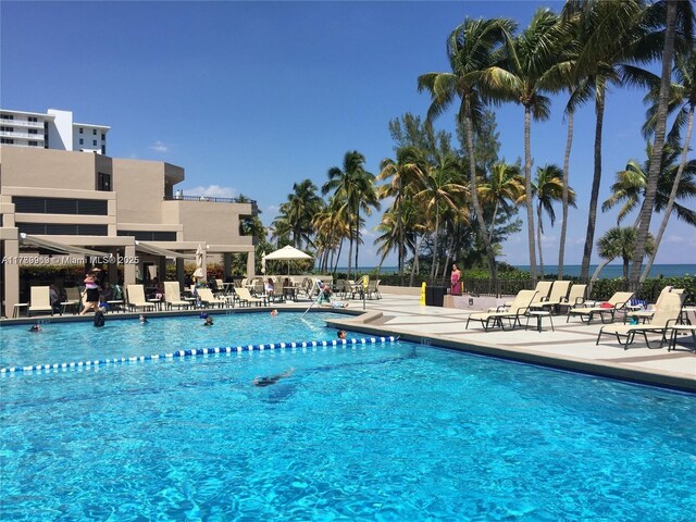 151 Crandon Blvd Unit 138, Key Biscayne, FL 33149 - pool featuring fence and a patio area