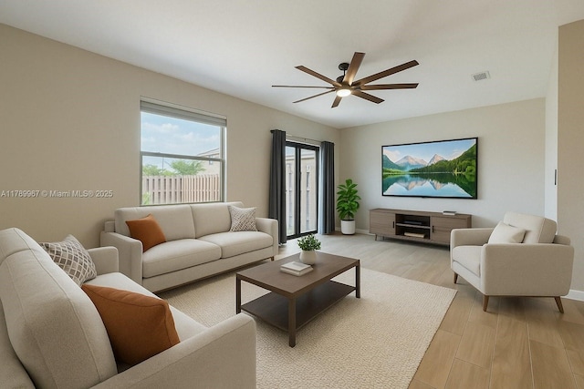 12950 SW 235th Ter, Homestead, FL 33032 - living room with light wood-type flooring, visible vents, a ceiling fan, and baseboards