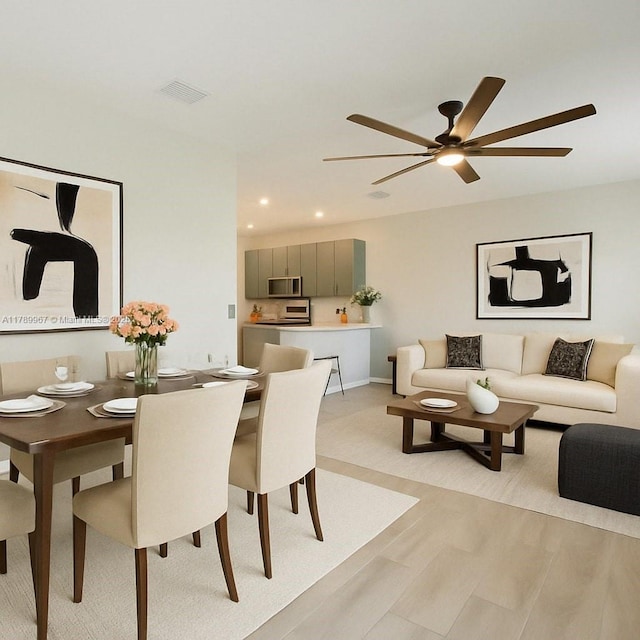 12950 SW 235th Ter, Homestead, FL 33032 - dining area featuring ceiling fan, light wood-style flooring, baseboards, visible vents, and recessed lighting