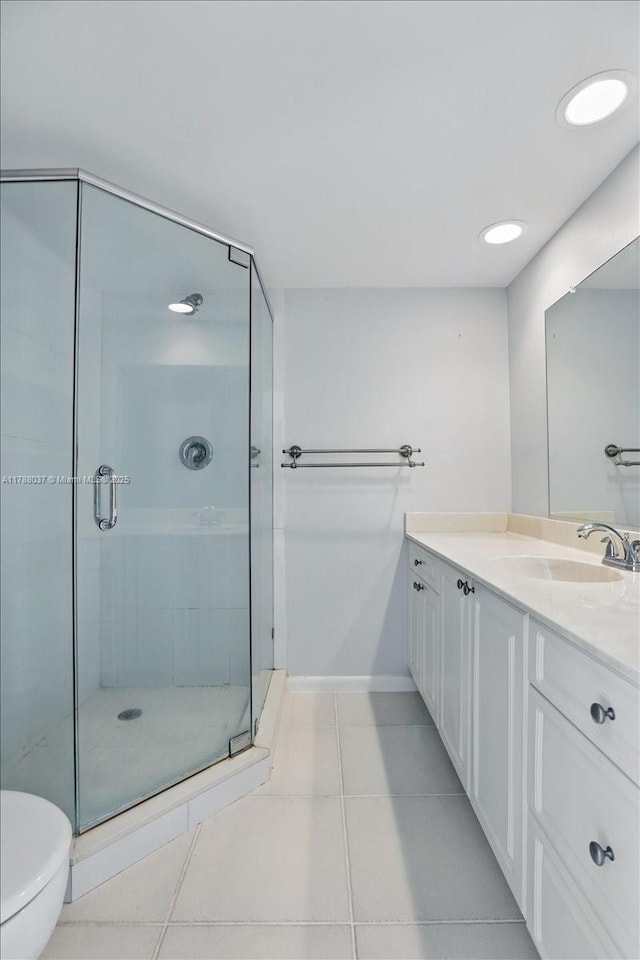 2412 24th Way, West Palm Beach, FL 33407 - bathroom featuring a stall shower, tile patterned flooring, and vanity