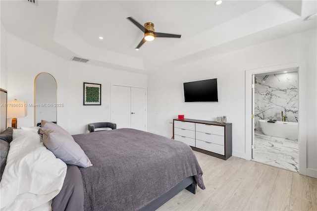 bedroom with concrete flooring, baseboards, and a notable chandelier