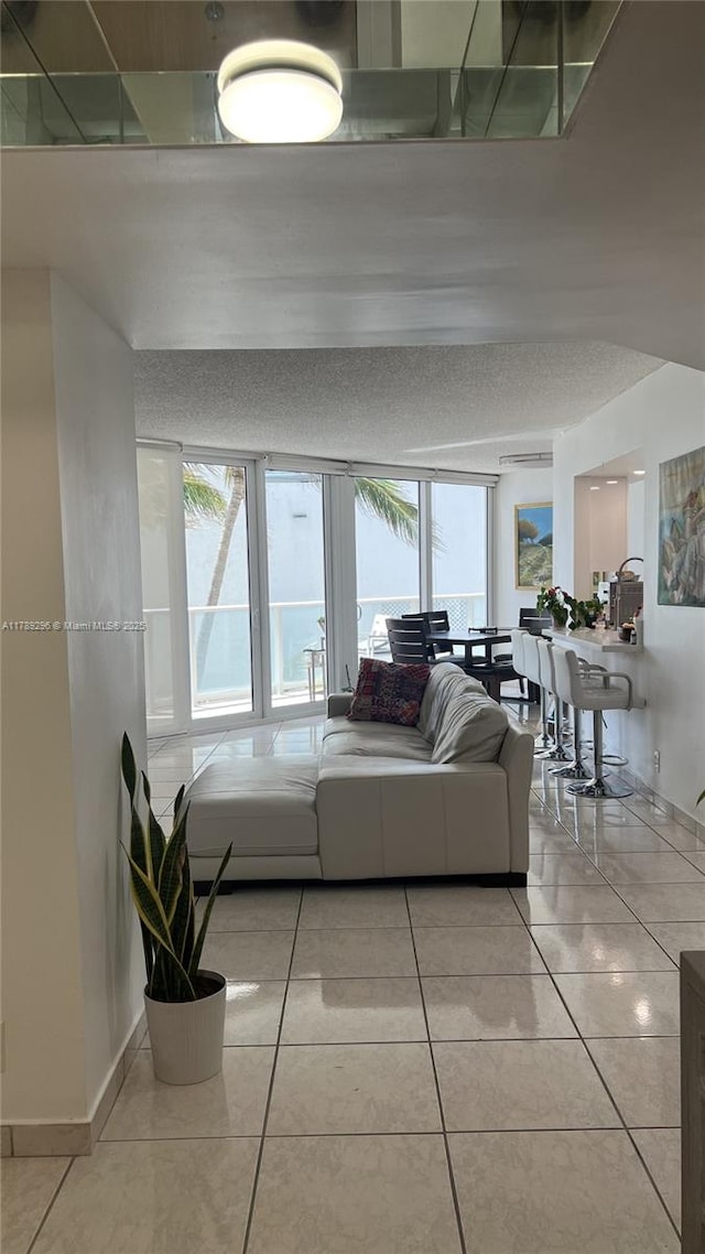 16485 E Collins Ave Unit 338, Sunny Isles Beach, FL 33160 - living room with light tile patterned floors