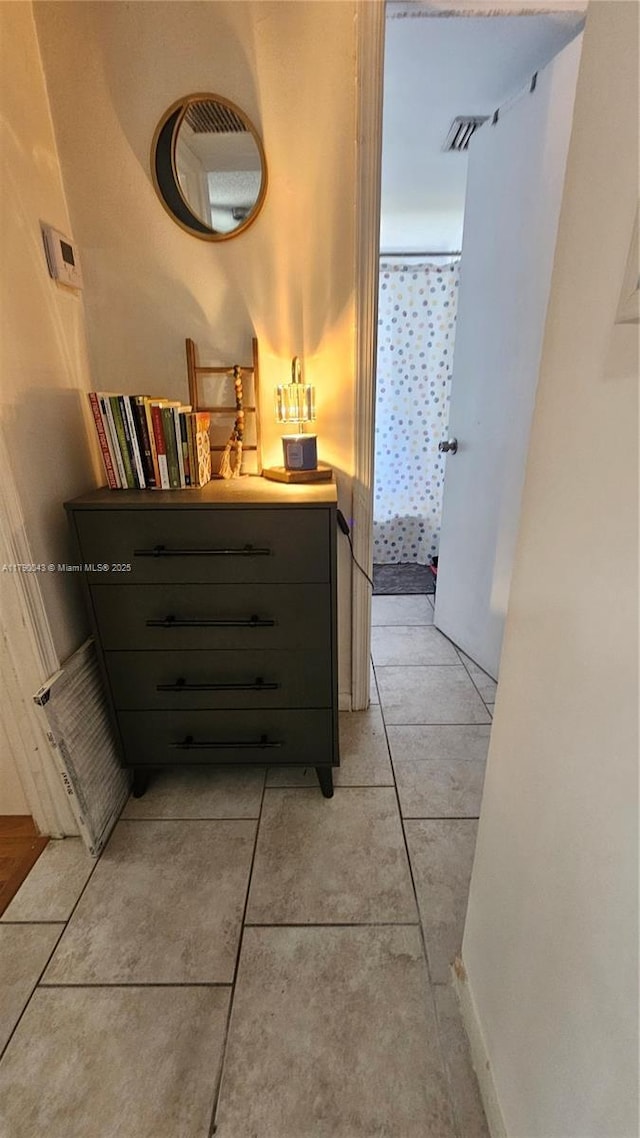 bathroom with vanity and tile patterned flooring