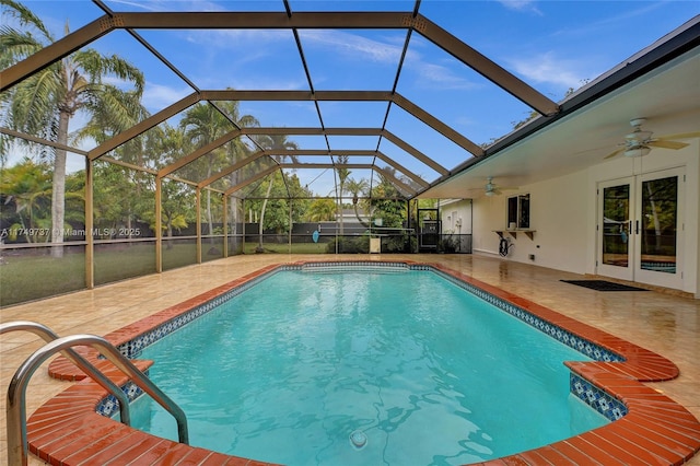 15440 SW 81st Ave, Palmetto Bay, FL 33157 - swimming pool with french doors, a ceiling fan, a patio area, and glass enclosure