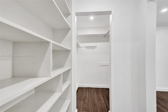 15440 SW 81st Ave, Palmetto Bay, FL 33157 - walk in closet featuring wood finished floors