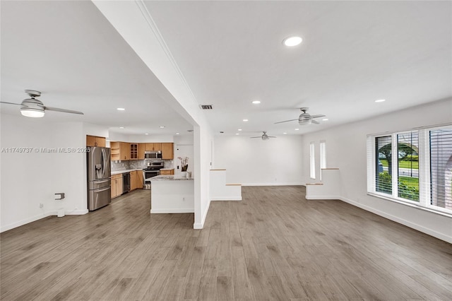 15440 SW 81st Ave, Palmetto Bay, FL 33157 - unfurnished living room featuring ceiling fan, recessed lighting, and baseboards