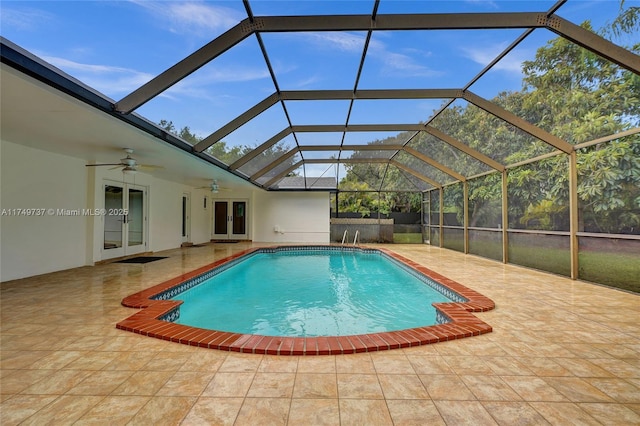 15440 SW 81st Ave, Palmetto Bay, FL 33157 - swimming pool with french doors, ceiling fan, a patio area, and a lanai