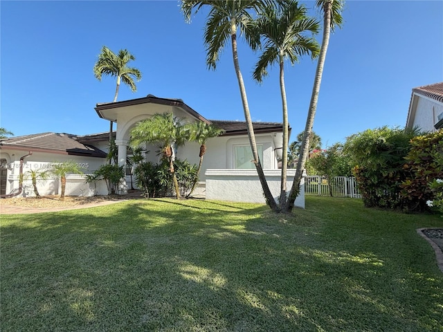 320 Windmill Palm Ave, Plantation, FL 33324 - view of side of property with stucco siding