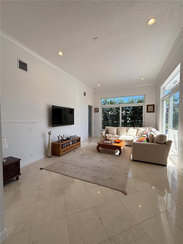 320 Windmill Palm Ave, Plantation, FL 33324 - living room with crown molding, healthy amount of natural light, a textured ceiling, and light marble finish flooring