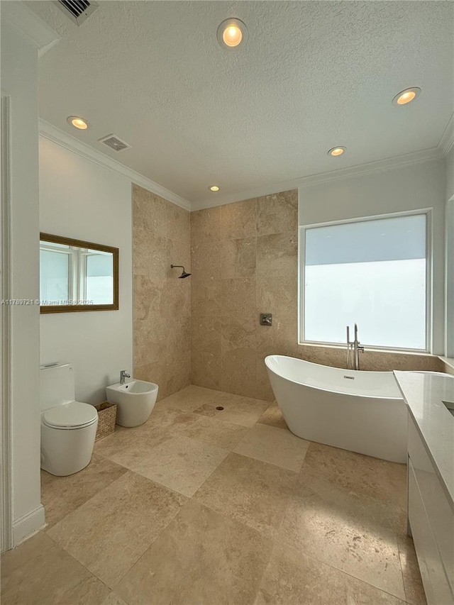 320 Windmill Palm Ave, Plantation, FL 33324 - bathroom with plenty of natural light, ornamental molding, a freestanding bath, recessed lighting, and a bidet