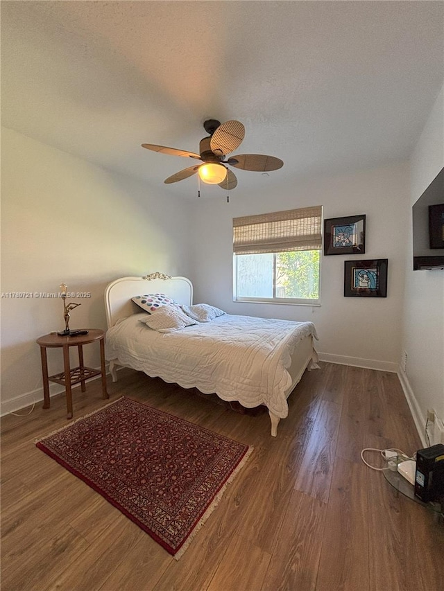 320 Windmill Palm Ave, Plantation, FL 33324 - bedroom with wood finished floors and ceiling fan