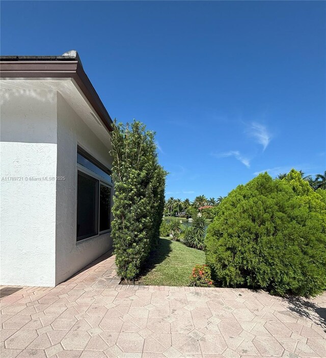 320 Windmill Palm Ave, Plantation, FL 33324 - view of patio / terrace