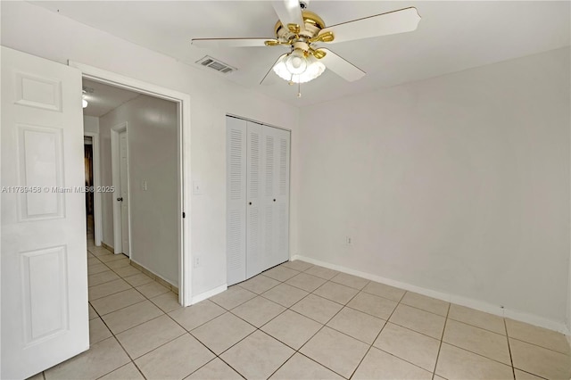 13250 SW 58th Ter Unit 10-8, Miami, FL 33183 - unfurnished bedroom with light tile patterned flooring, baseboards, visible vents, a ceiling fan, and a closet